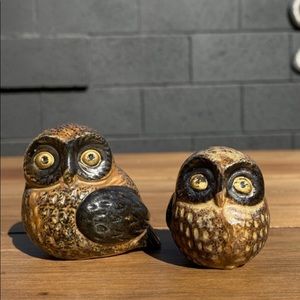 Set of two small owls in browns and gold eyes